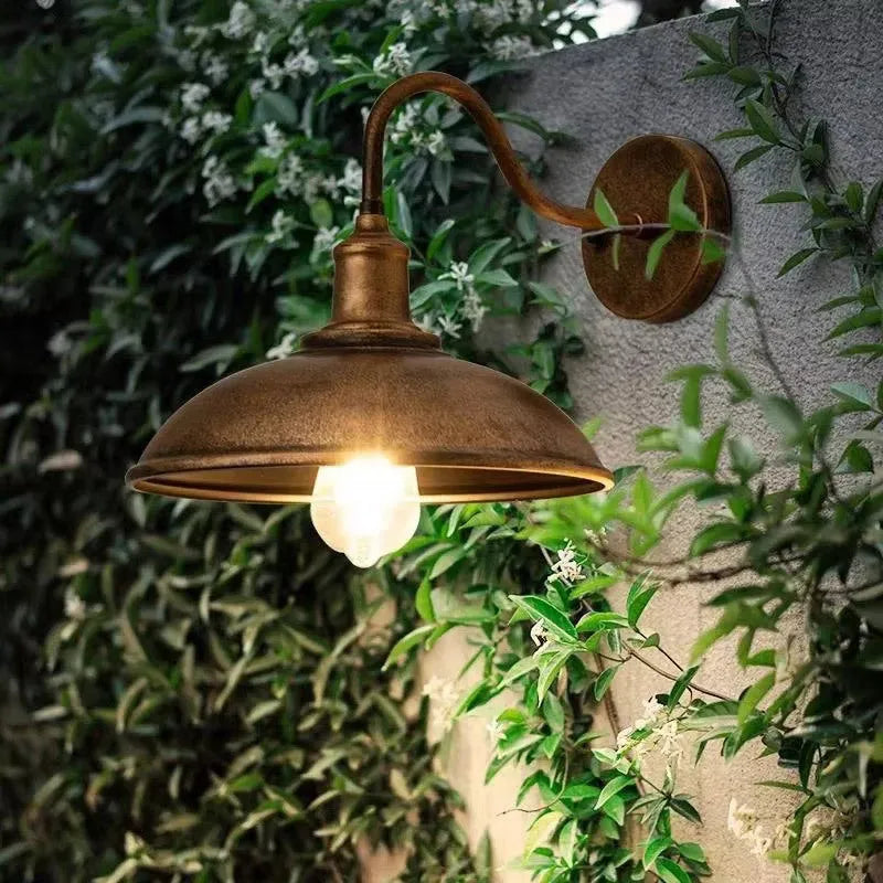 Retro style metal wall lamp for outdoor courtyards, shown in copper and silver finish options.
