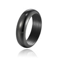 Glossy electroplated titanium steel ring shown in gold, black, and steel colour on a grey background.