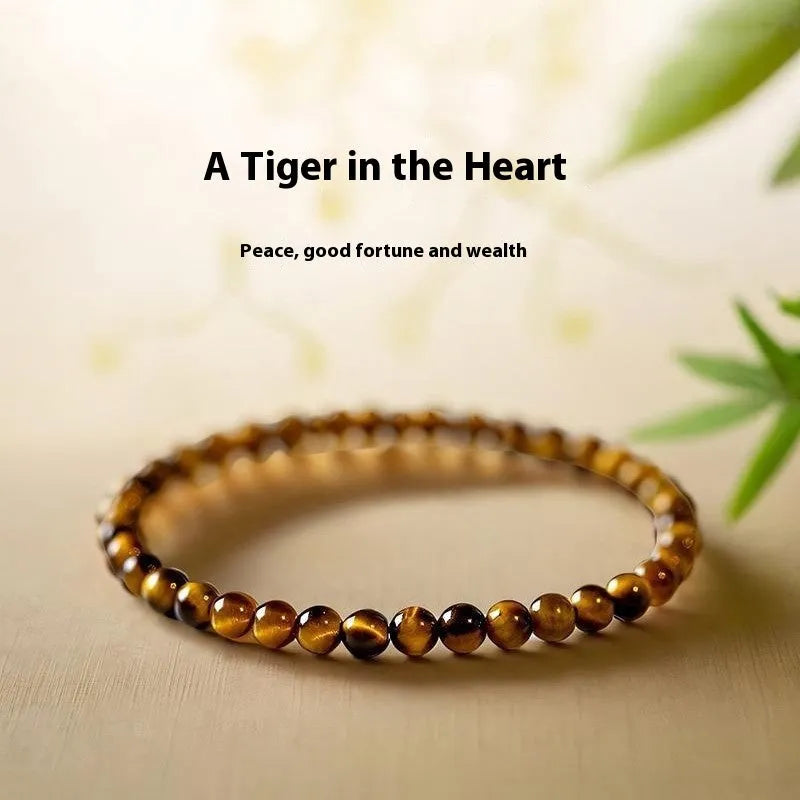 Tigereye stone geometric round bracelet in 4mm, 6mm, and 8mm bead size options.