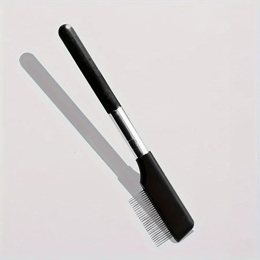 Black pet grooming brush with soft bristles for eye tear stain removal and comb attachment for dogs and cats