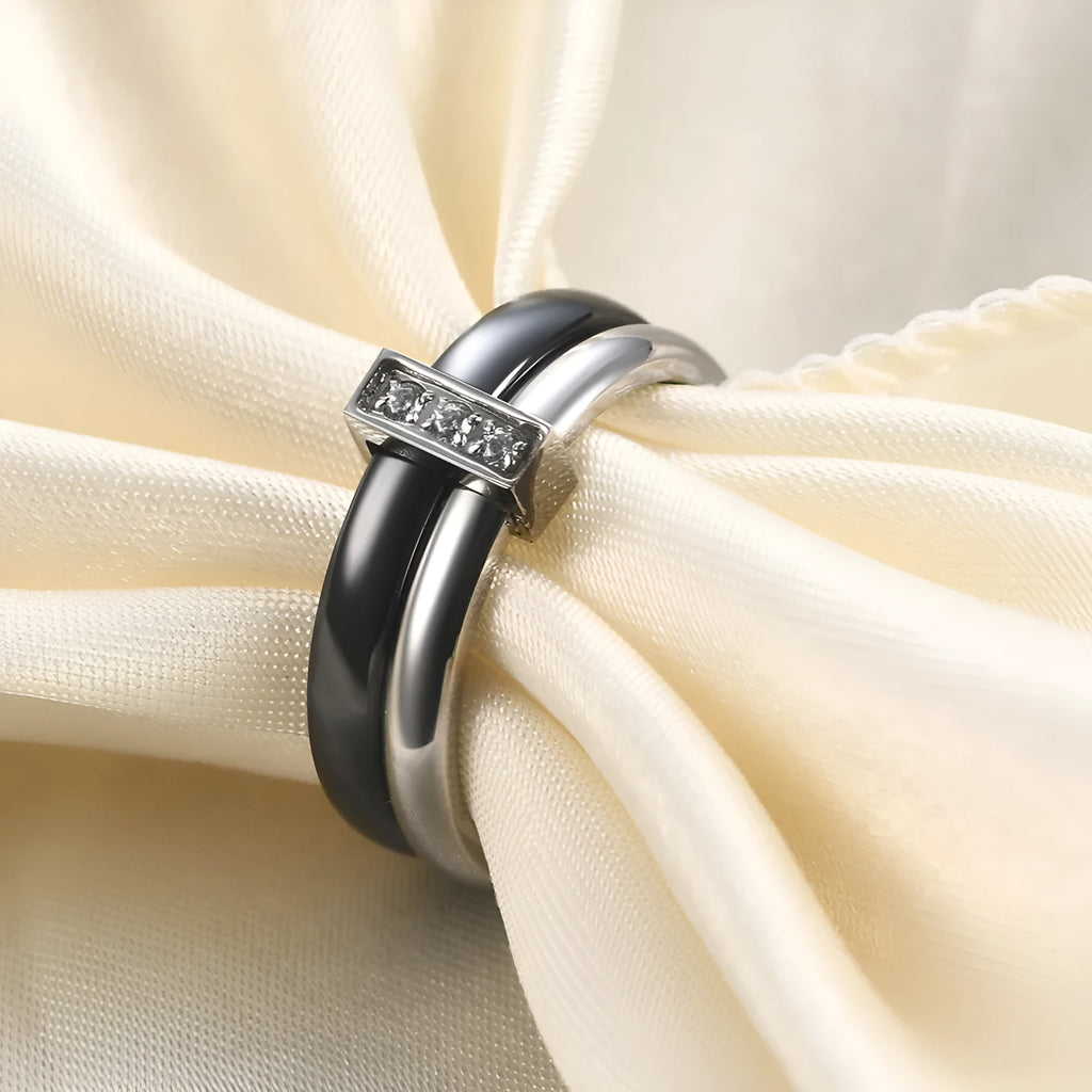 Women's ceramic ring with 6mm band width, geometric round shape, and glossy stitching detail in steel black finish