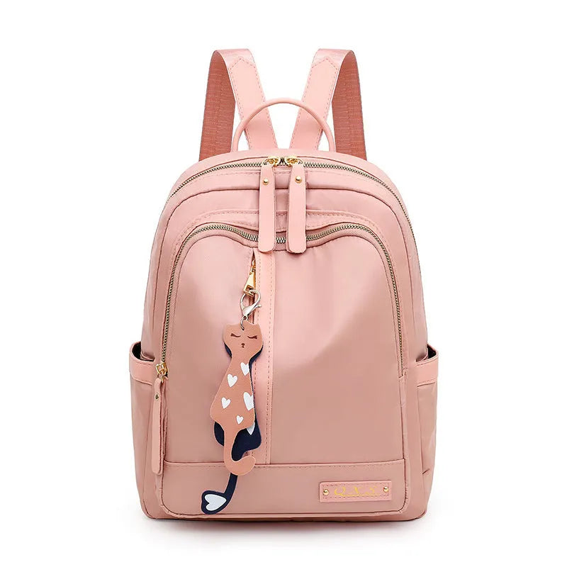 Women's nylon casual backpack in black with double shoulder straps and front pocket