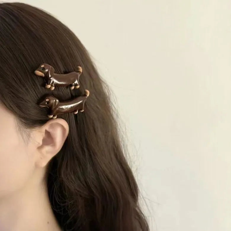 Dachshund dog design hair barrettes with electroplated finish in loose delicate styling