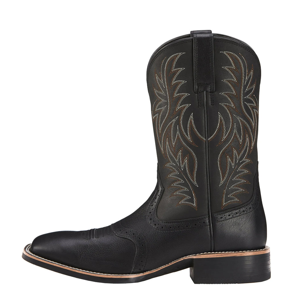 Men's brown cowboy boots with detailed embroidery on the high shaft and a square toe.