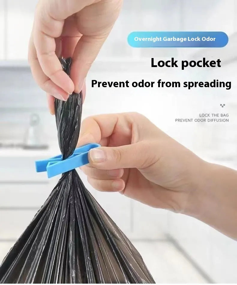 Transparent plastic non-slip clip for holding a garbage bag on the rim of a bin.
