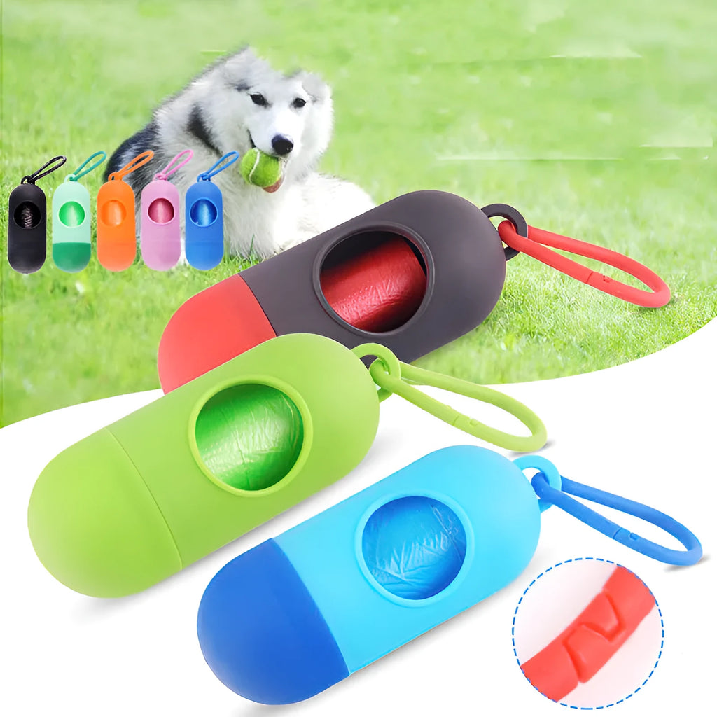 Compact black dog poop bag dispenser with side hook and Velcro strap, shown next to a roll of waste bags.