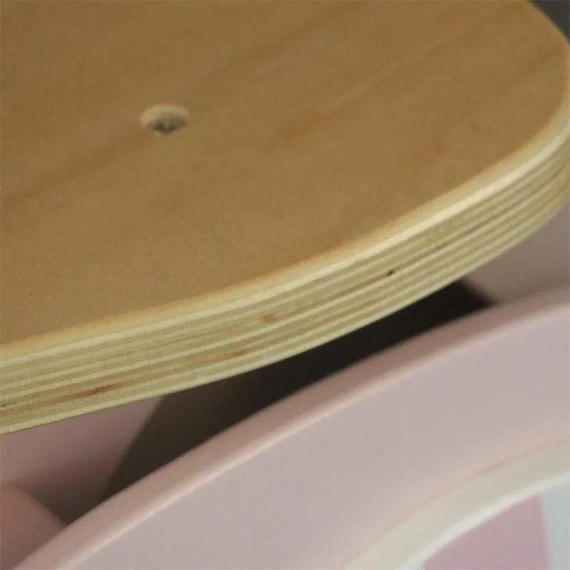 Pink wooden balance scooter for toddlers with 10-inch wooden platform