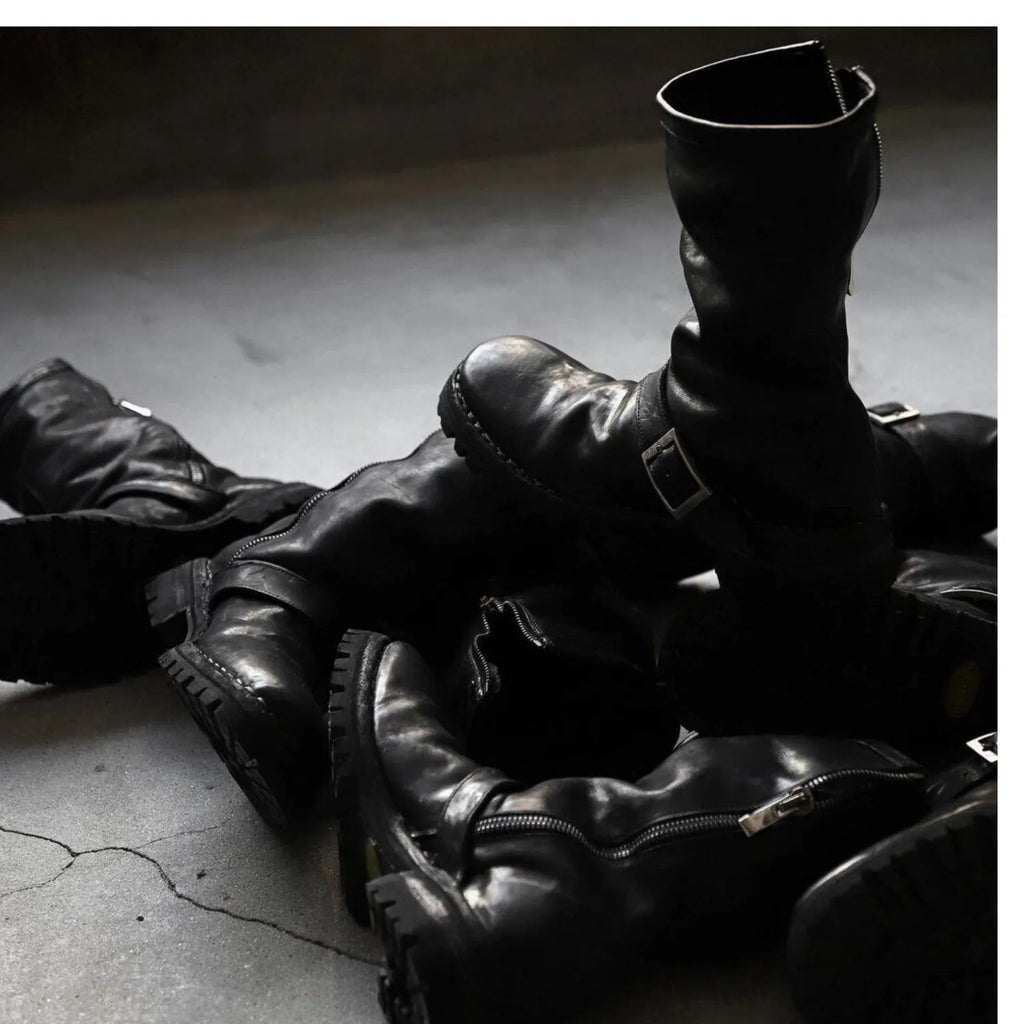 Men's black retro-style Martin boots with a side zip and round toe