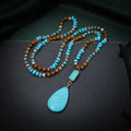 Turquoise blue water drop pendant necklace with heart shape design on mixed material ball bead chain