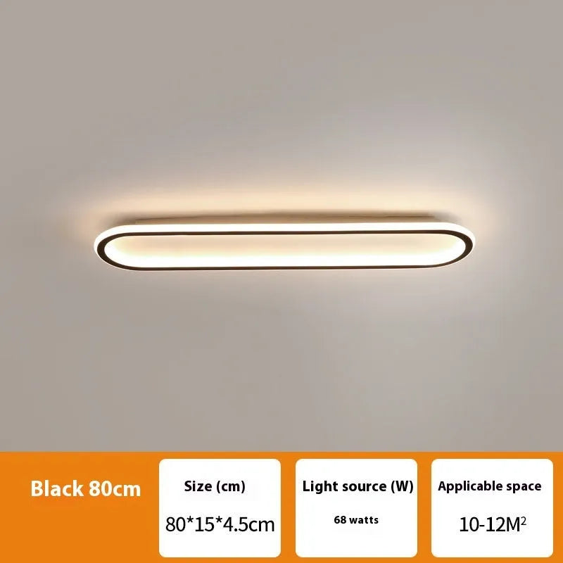 Minimalist aluminium strip ceiling lamp in black finish, shown mounted on a white ceiling.