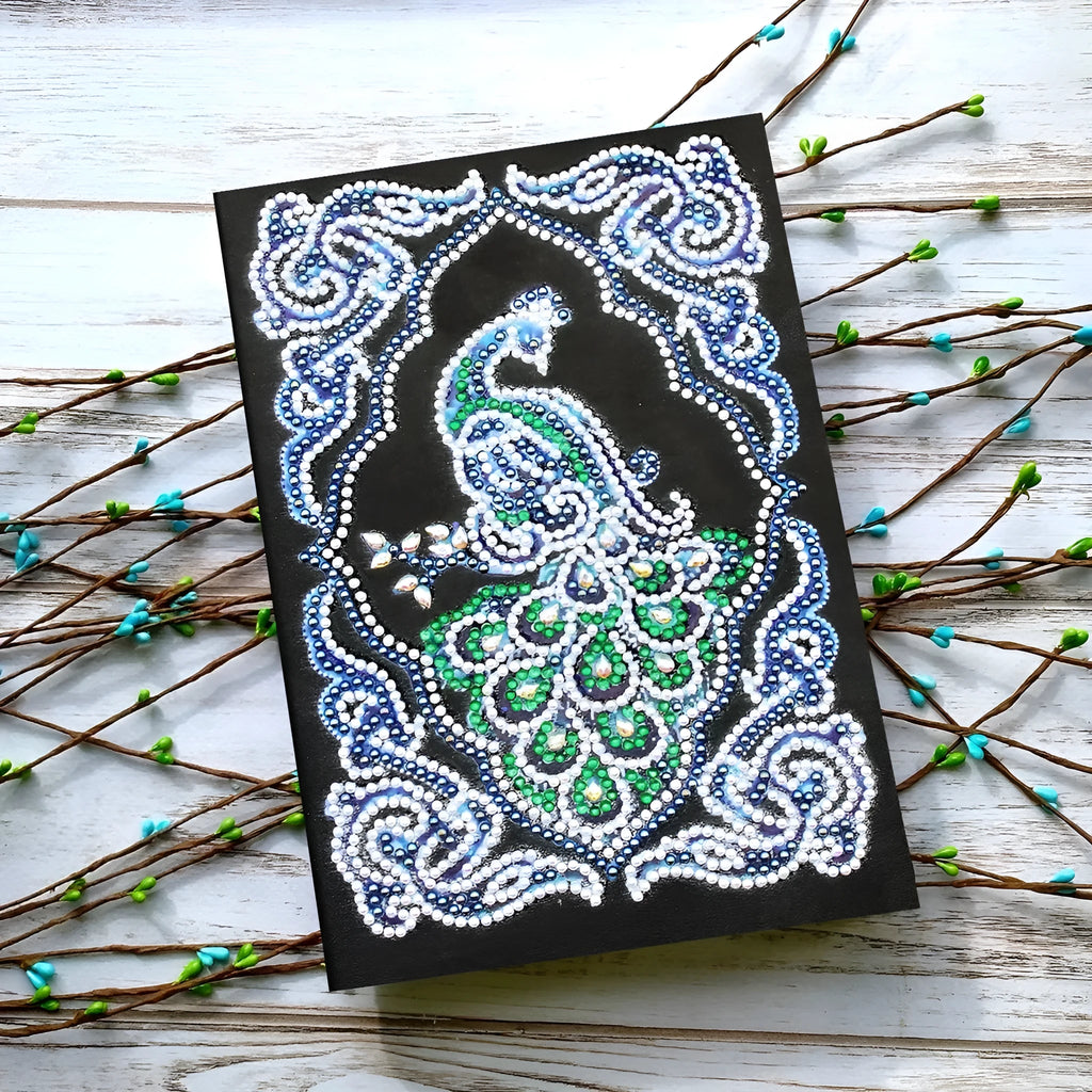 Black A5 diamond painting notebook featuring a peacock pattern with shaped and bright resin drills.