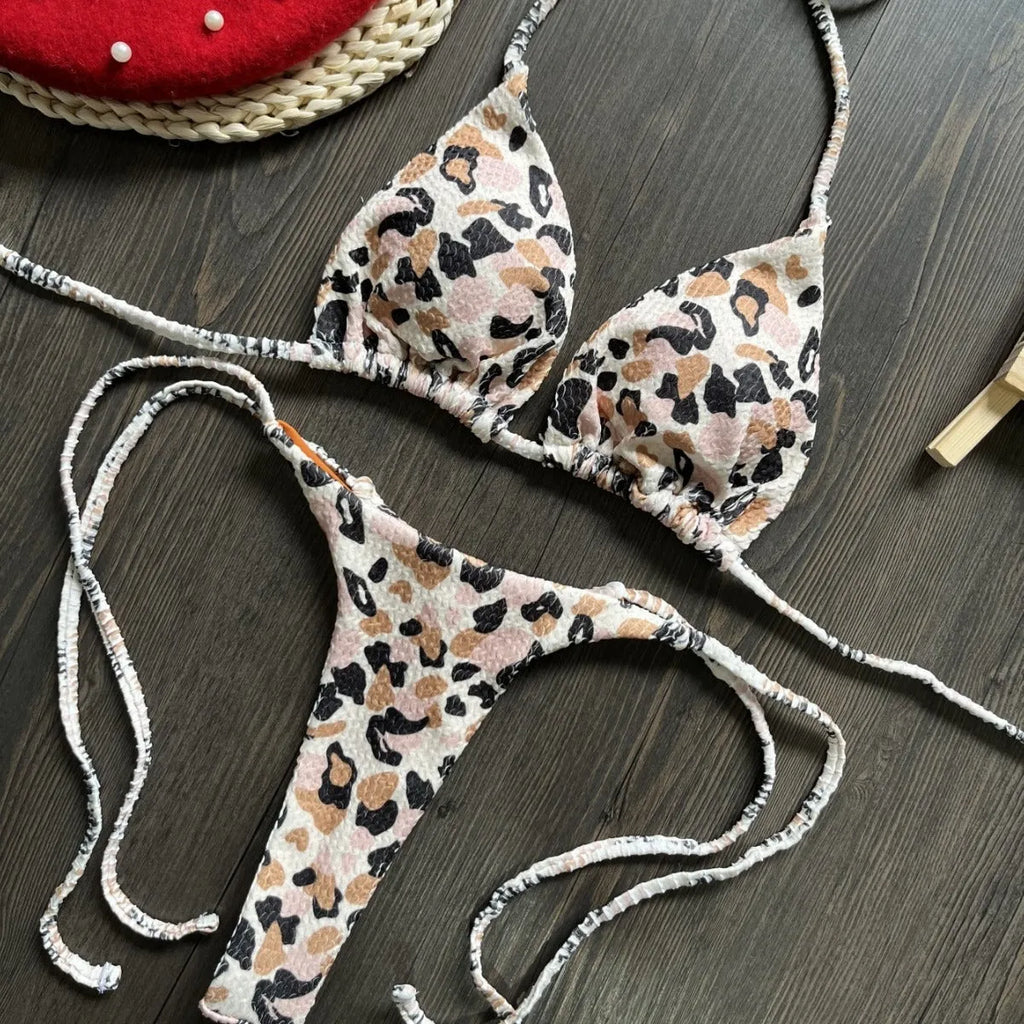 Women's printed beach bikini swimsuit with cotton lining on mannequin