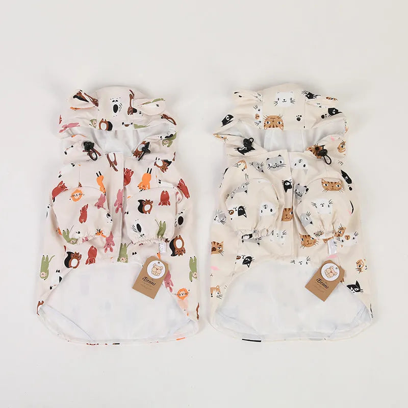 Beige cartoon pattern dog raincoat with double waterproof coating in sizes from small to extra-extra-large