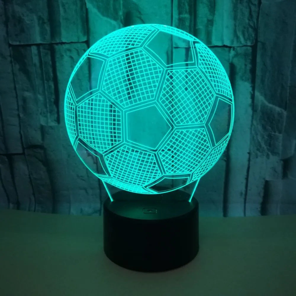 3D football night light showing colour changing display with touch controls and USB cable