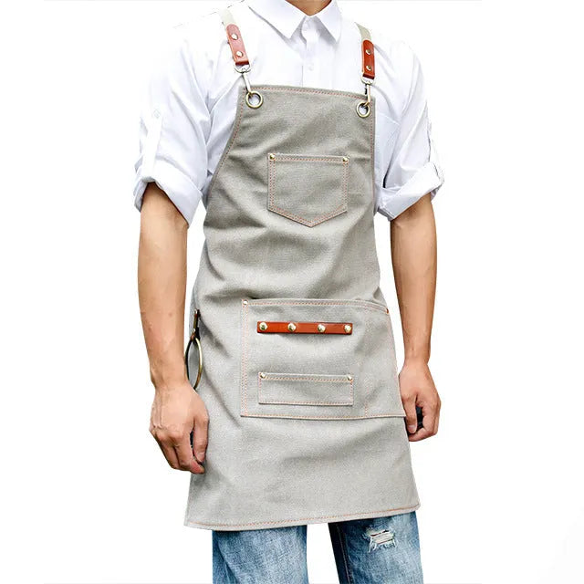 Canvas apron with cross-back straps in camel colour for kitchen and gardening protection