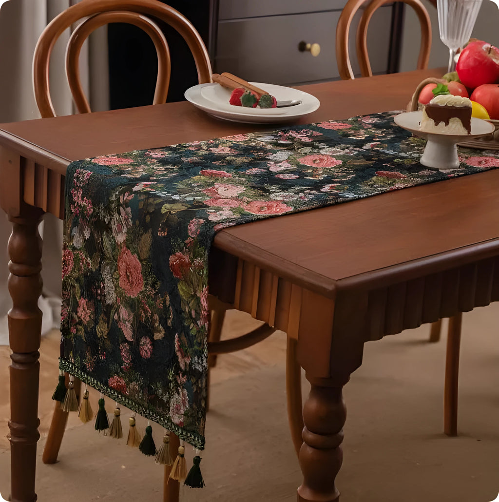 A retro style table flag with handwoven tassels in a blue ginkgo leaf pattern on a table.