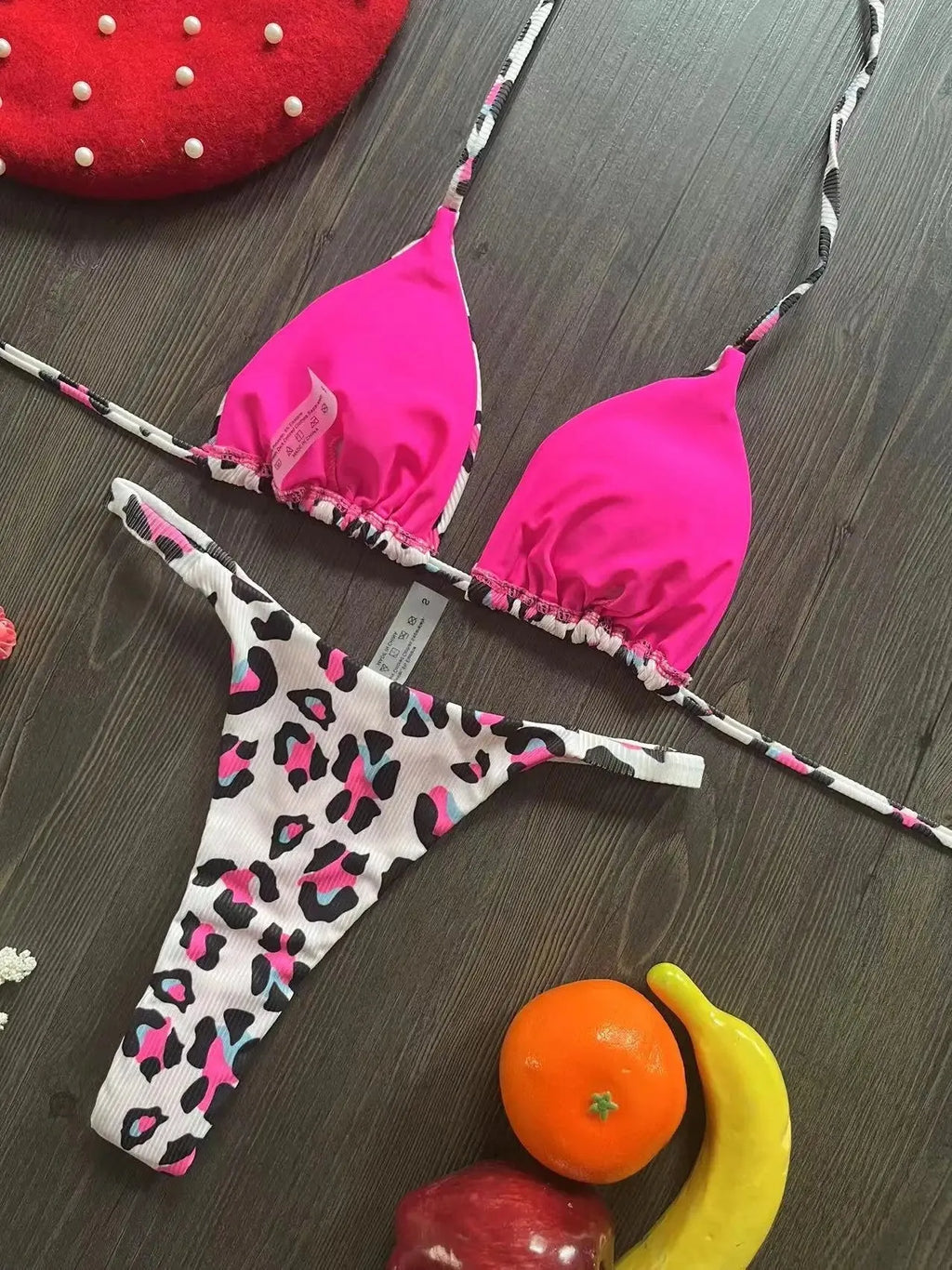 Women's printed beach bikini swimsuit with cotton lining on mannequin