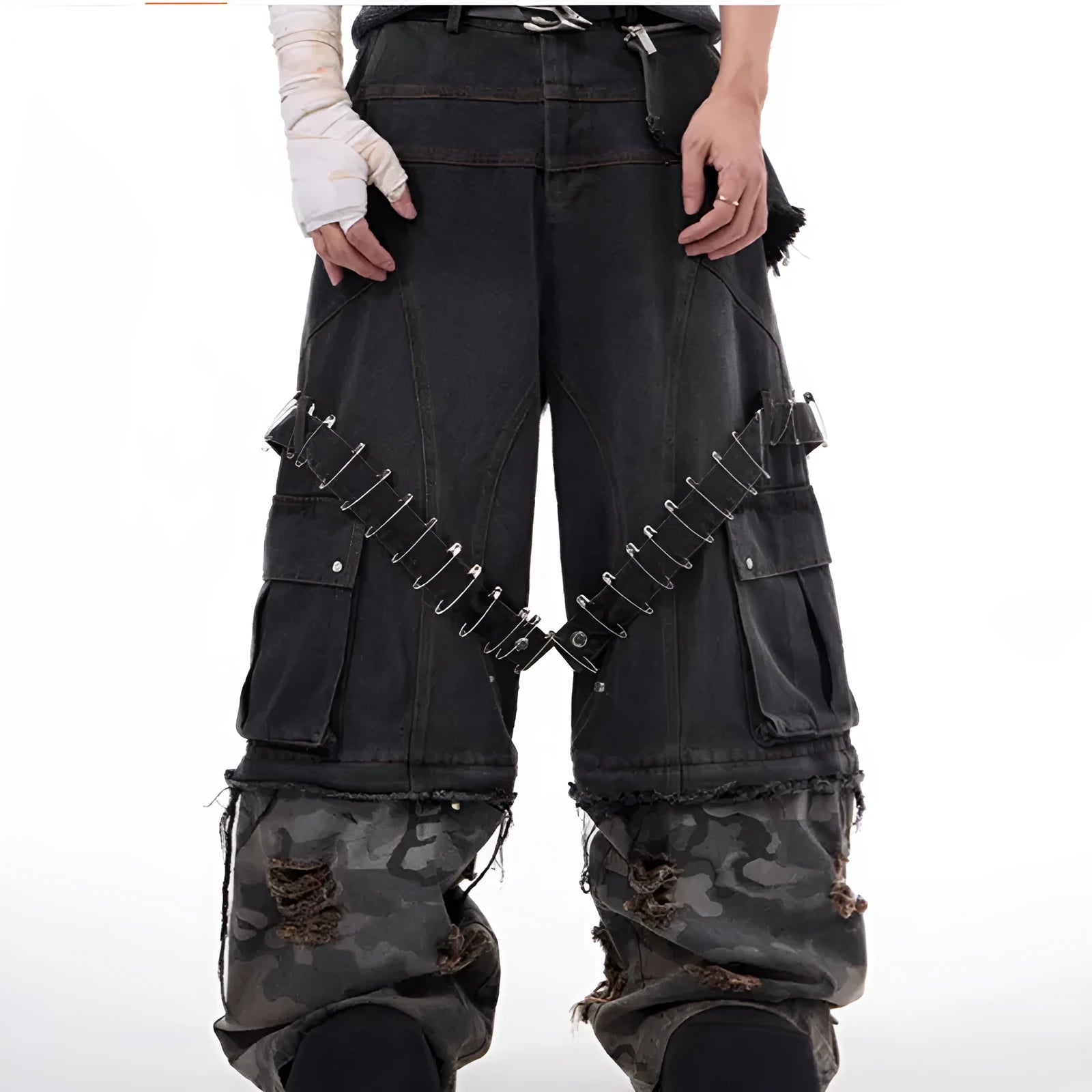 Men's grey jeans with camouflage print panels and ribbed texture panels on the legs.