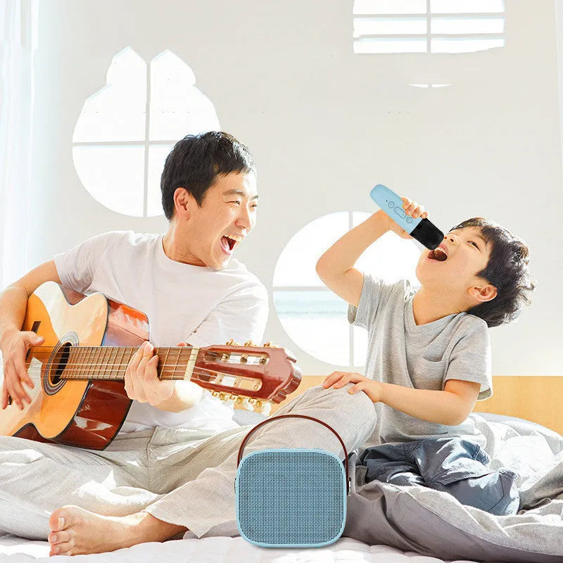 Portable Bluetooth speaker with microphone in white, pink or blue colour options showing compact dimensions