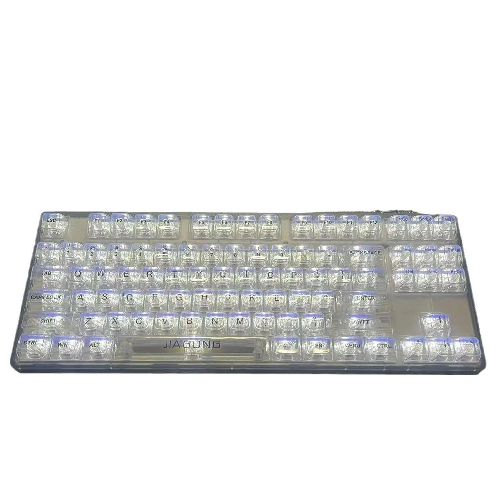 132 transparent plastic mechanical keyboard key caps laid out in grid pattern