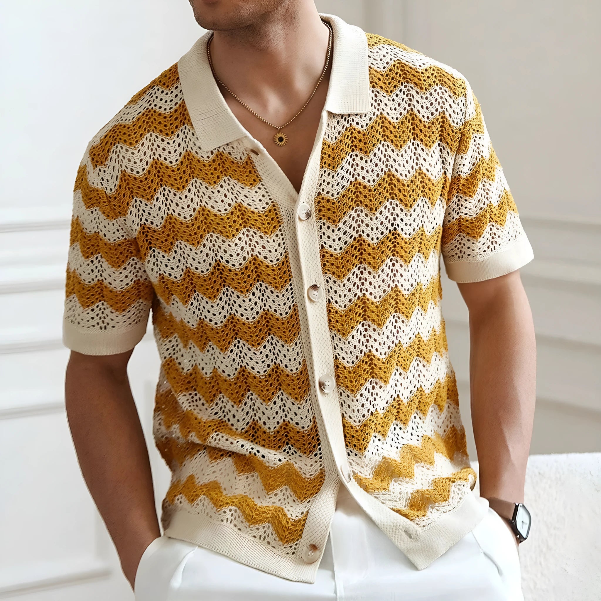 Men's blue short-sleeve sweater with a textured hollow jacquard corrugated pattern.