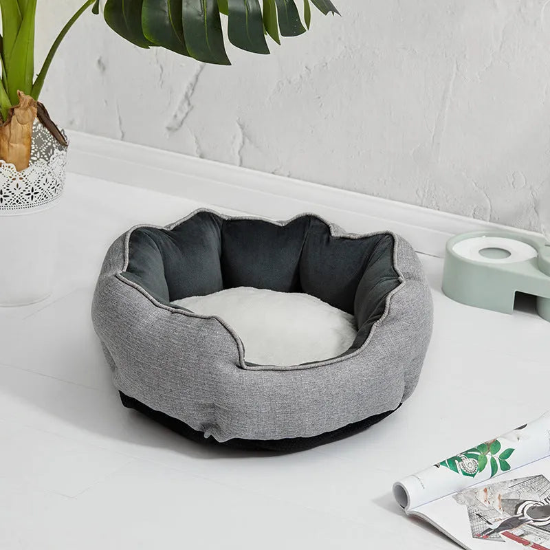 Blue octagonal pet bed with raised sides and removable mats for cats and small dogs