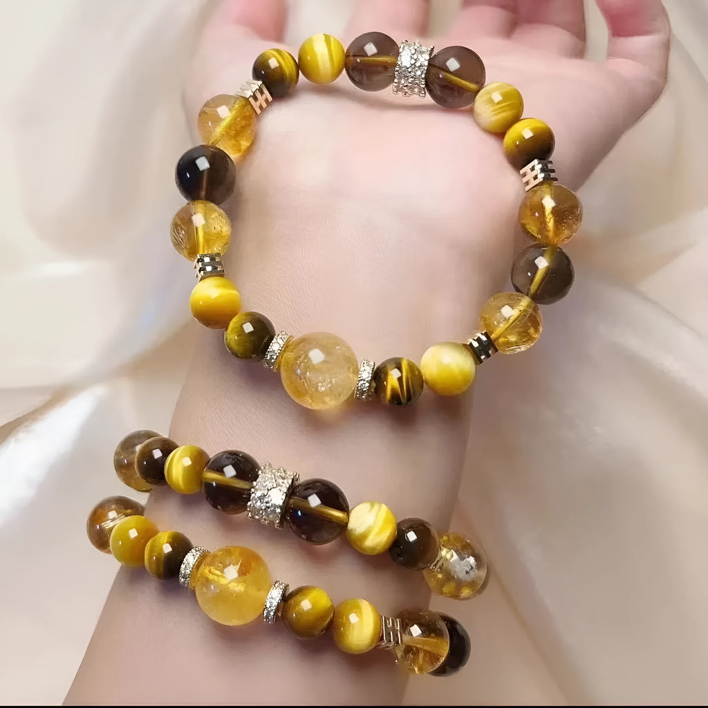 Natural yellow tower crystal string beads bracelet with 10mm Jinba design on wrist