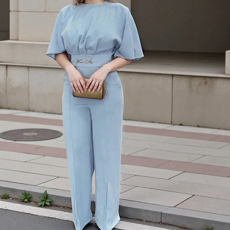Blue men's polyester suit with trousers and long-sleeved shirt on hanger