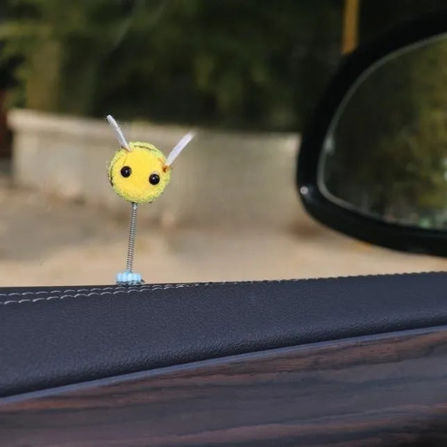 Yellow and black fur ball bee car decoration measuring 3x3 cm
