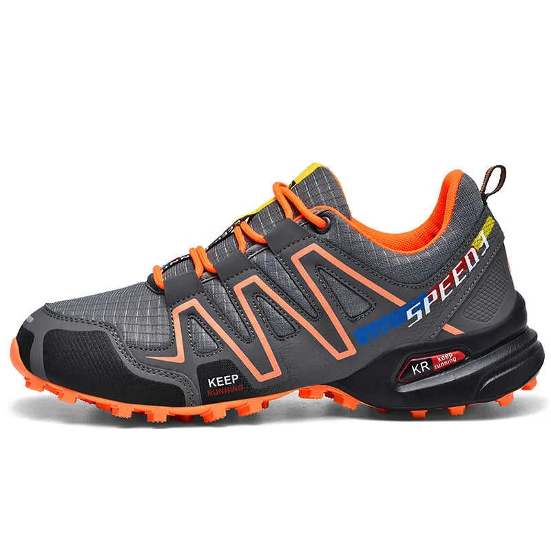 Men's grey orange plus size casual running shoes with low-top design on a plain background.
