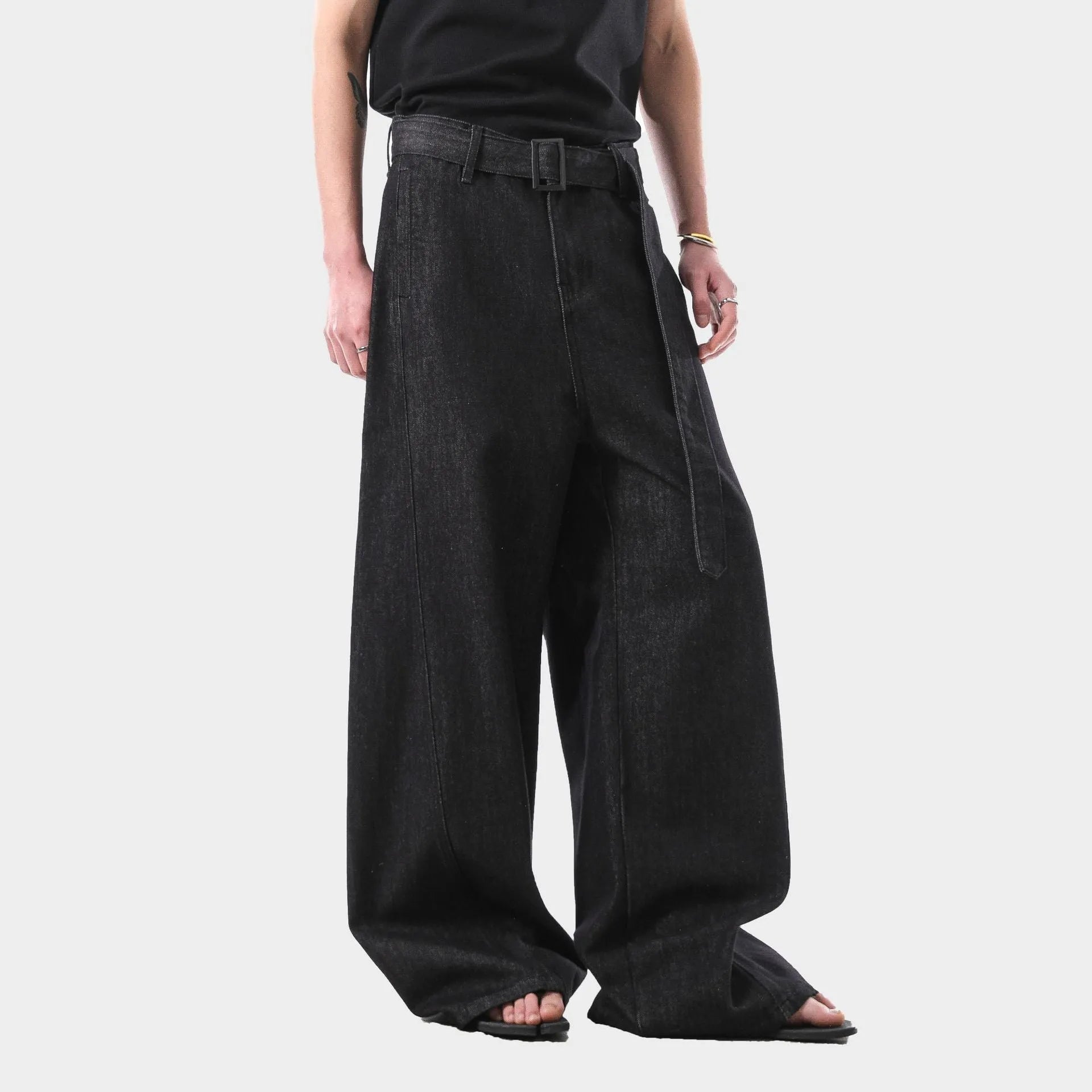 Black high waist straight leg women's jeans made from cotton denim on a model.