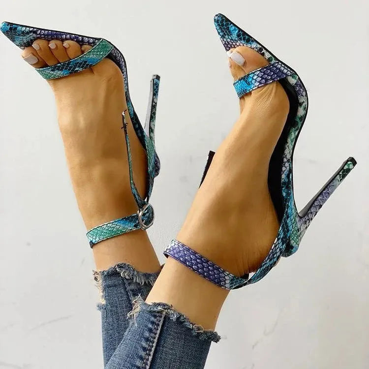 Blue women's high heels with serpentine hollow-out pattern and buckle fastening