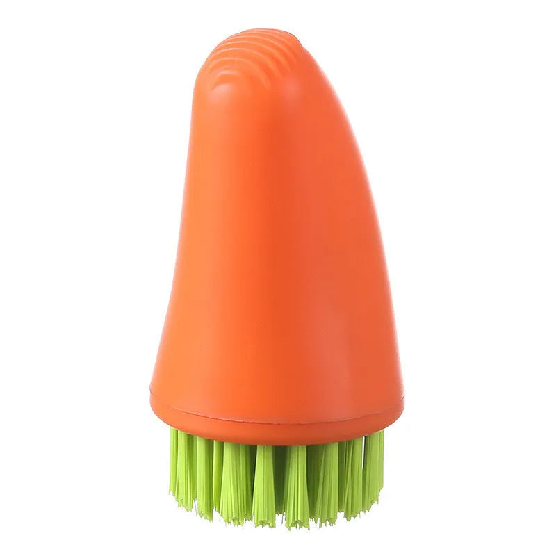 White and orange carrot-shaped nylon kitchen cleaning brush with dense bristles.