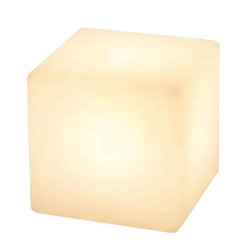 Modern square white LED cube stool light for garden patio with solar panel on top.