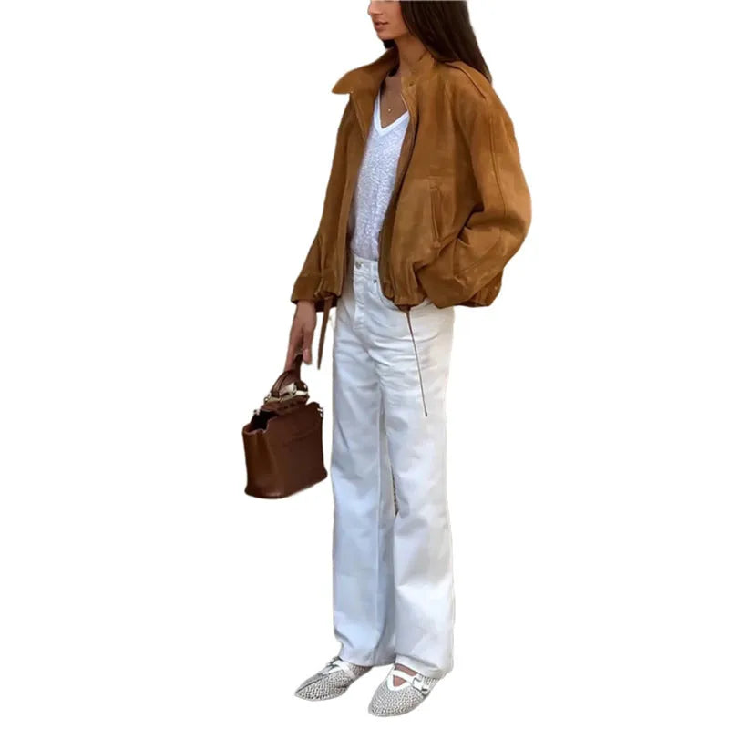 Retro solid colour loose-fit long sleeve polyester jacket on a hanger.