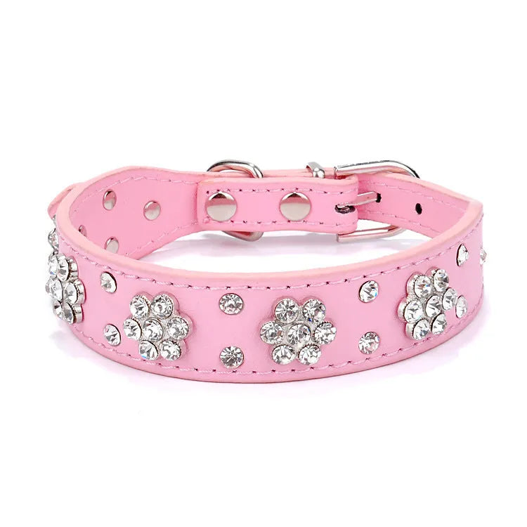Rhinestone flower pattern on a black adjustable PU leather dog collar with metal D-ring for small dogs.
