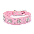 Rhinestone flower pattern on a black adjustable PU leather dog collar with metal D-ring for small dogs.