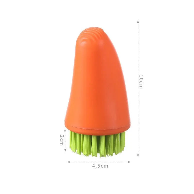 White and orange carrot-shaped nylon kitchen cleaning brush with dense bristles.