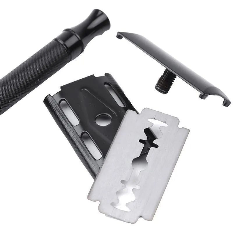Old-fashioned manual metal shaving scraper and brush set in black and silver finishes