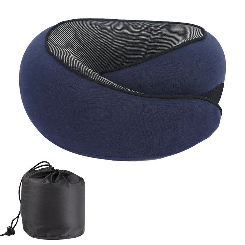 A U-shaped memory foam neck pillow in a modern simplicity style, shown with its included storage bag.