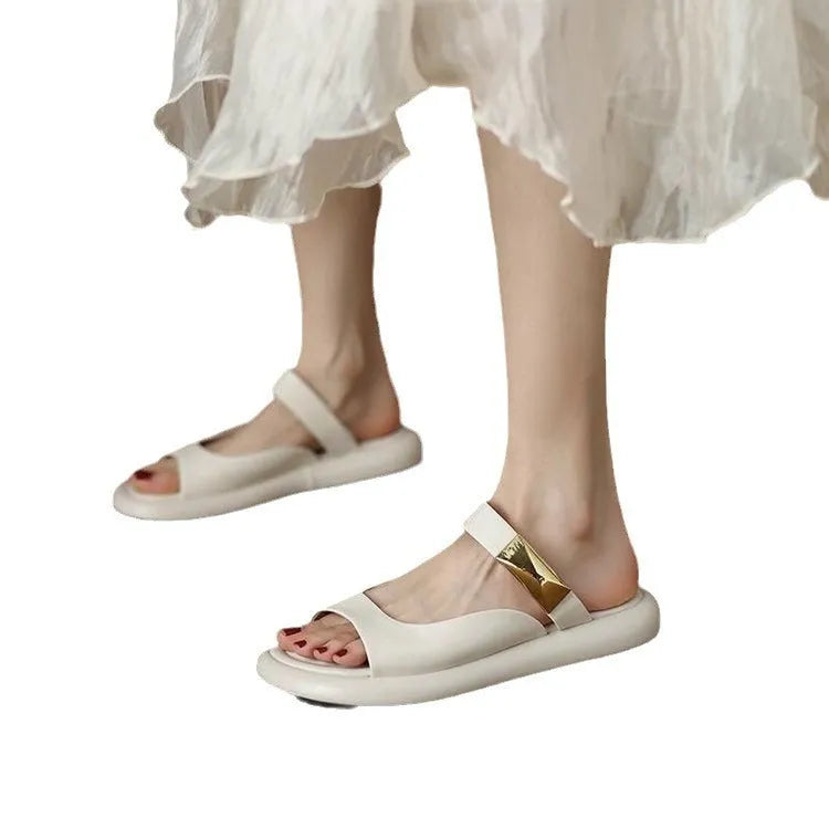 Apricot and white women's platform sandals with a peep toe and flat rubber sole.