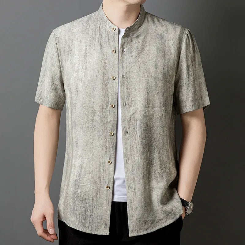 Men's loose fit linen shirt in solid colour with stand collar, shown in black grey.