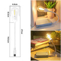 Folding USB rechargeable night light with glowing tungsten filament bulb.
