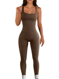 Women's long sleeve spandex suspender tank top tights with a button detail waistband.