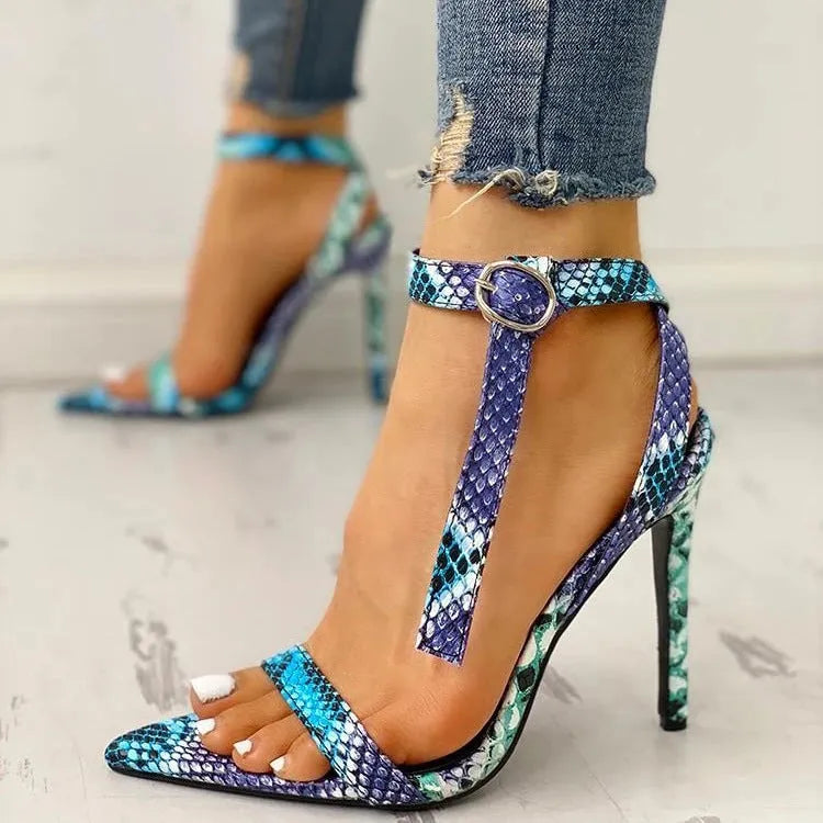 Blue women's high heels with serpentine hollow-out pattern and buckle fastening