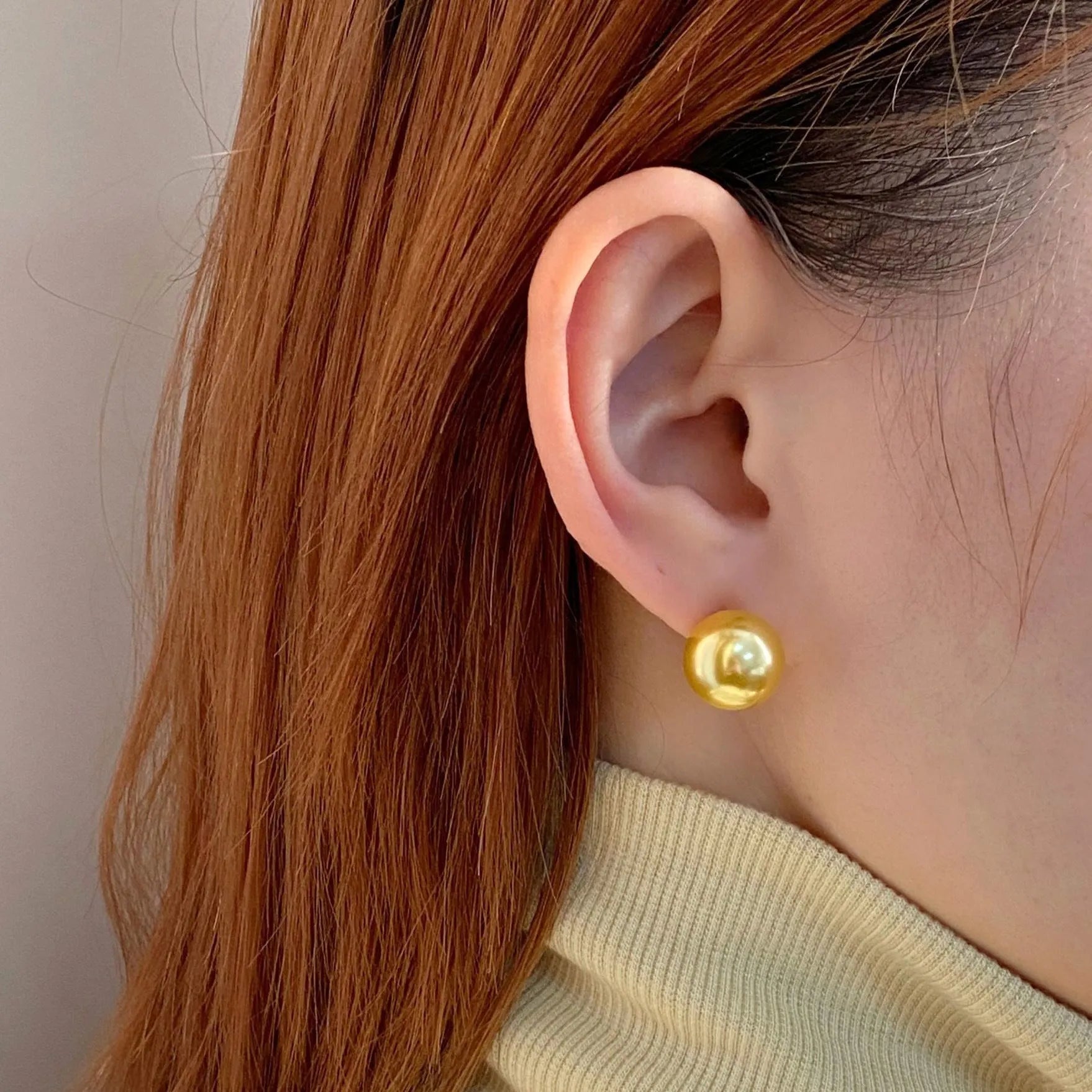 Geometric pearl stud earrings in silver with retro styling and multiple size options