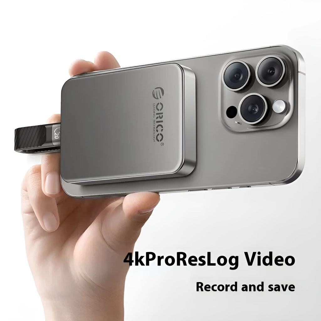 Grey magnetic mobile SSD portable hard drive with ultra-thin design and magnetic suction ring