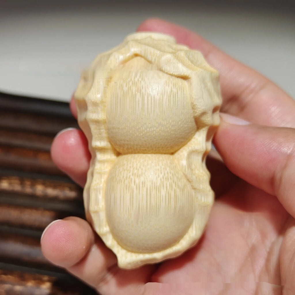 Hand-carved solid bamboo peanut ornament in modern simple style