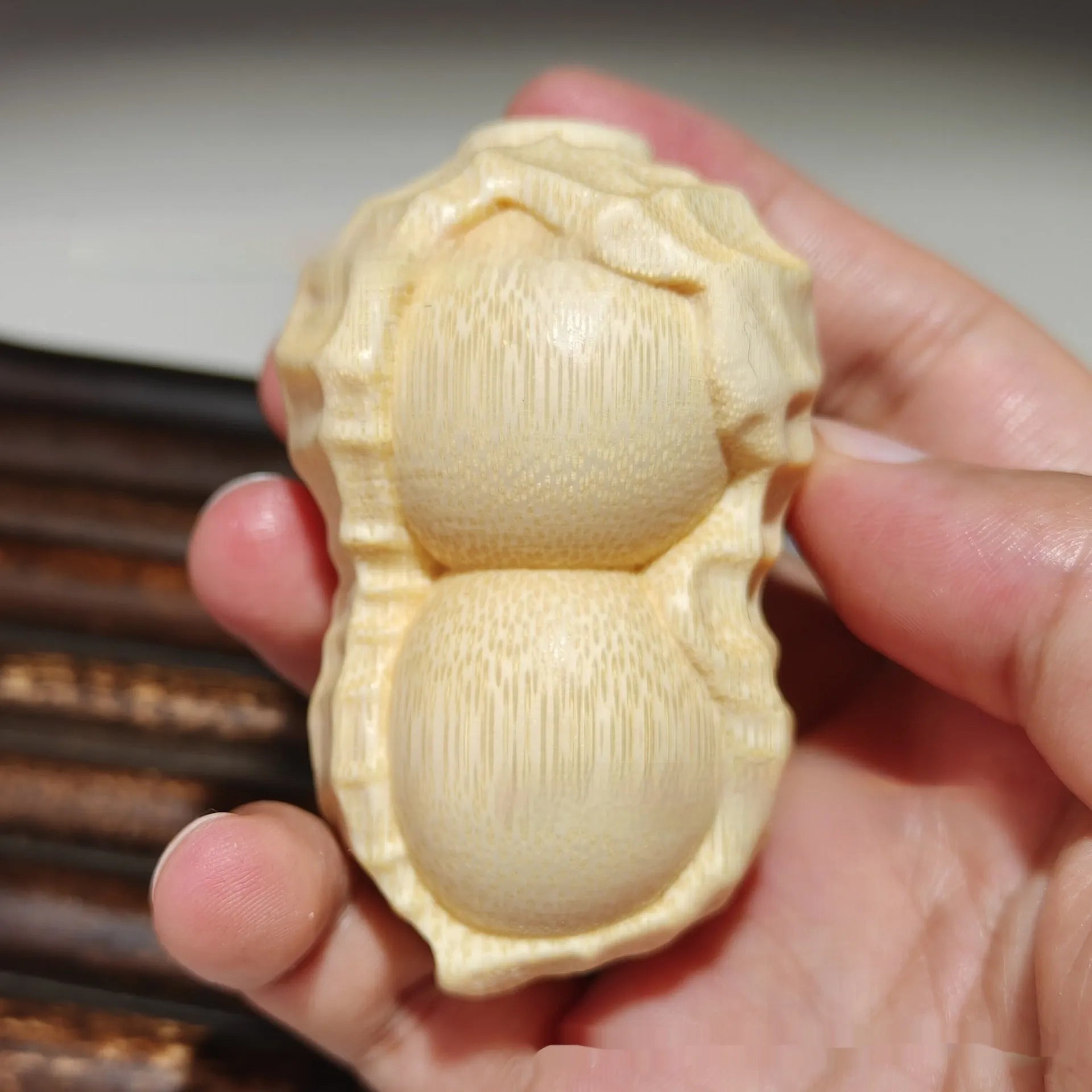 Hand-carved solid bamboo peanut ornament in modern simple style