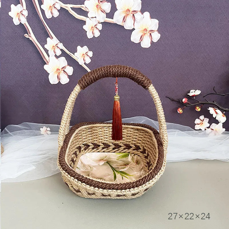 Round hand-woven hemp rope basket in a natural colour with a flat base.